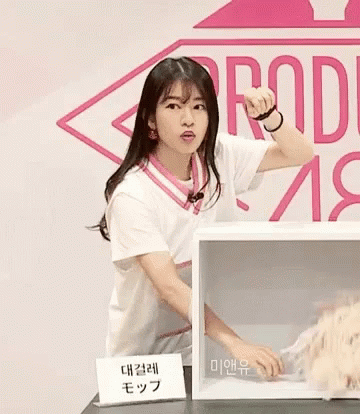 Girl Standing in Front of Box Saying I'm a Girl