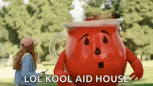Girl Standing Next To Red Kool Aid House Pitcher GIF