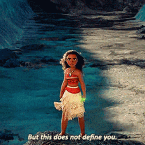 Girl Standing on Rock Saying But This Does Not Define You