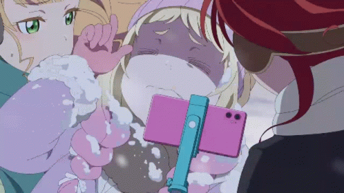 Girl Taking Photo with Pink Phone
