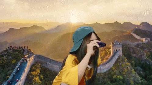 Girl Taking Picture of Great Wall of China