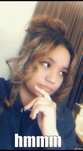 Girl Taking Selfie Saying Hmmm