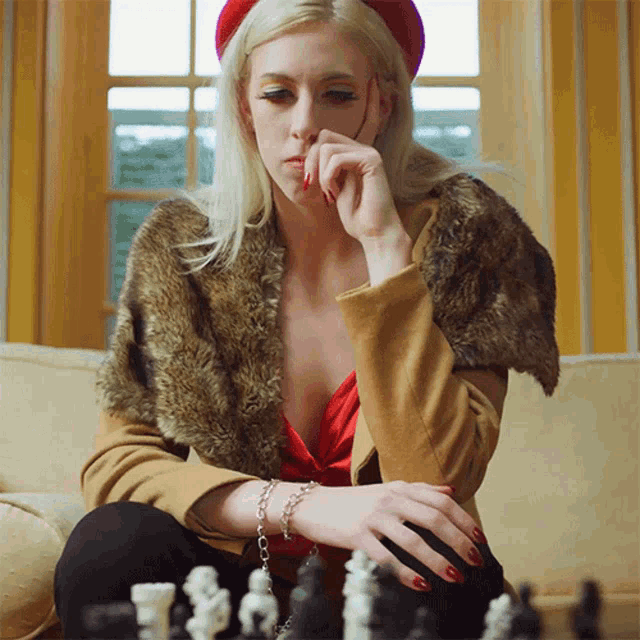 Girl Thinking With Chess GIF