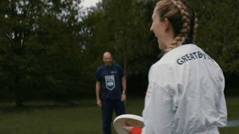 Girl Throwing Frisbee GIF