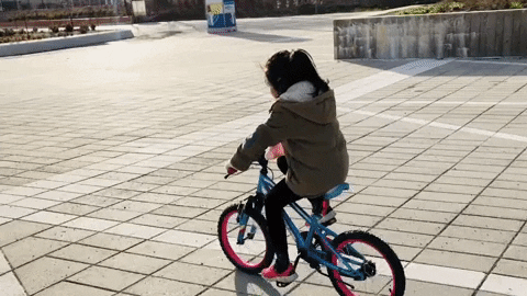 Girl Toddler Riding Bike GIF