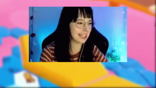 Girl Wearing Glasses and Headphones Smiling