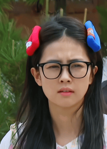Girl Wearing Glasses and Red Blue Headband