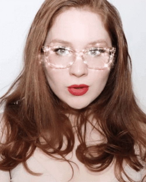 Girl Wearing Glitter Glasses GIF