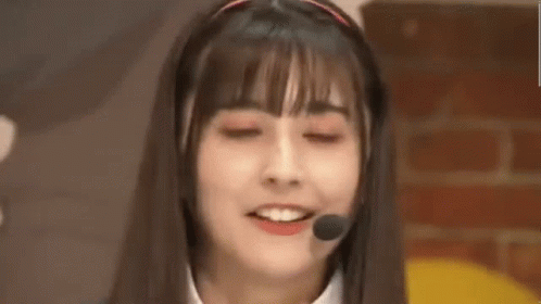 Girl Wearing Headset With Chinese Writing