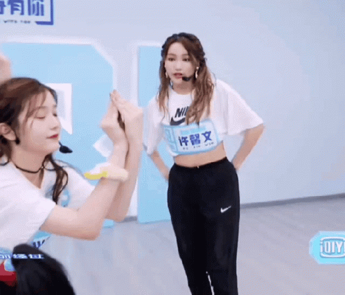 Girl Wearing Nike Shirt with Chinese Writing