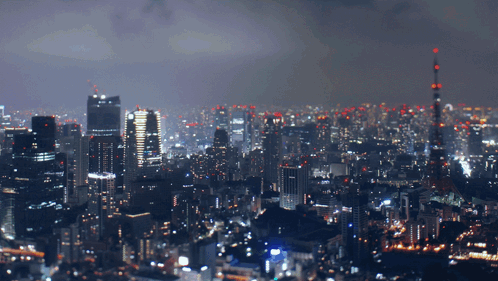Girl With Angel Wings In Front Of City GIF