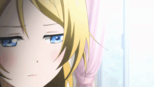 Girl with Blonde Hair and Blue Eyes Making Face