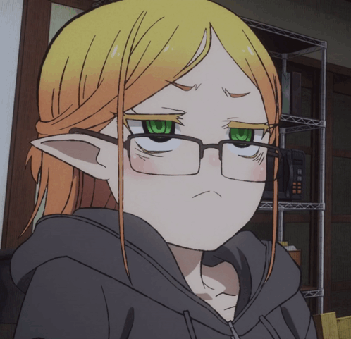 Girl with Blonde Hair and Green Eyes in Glasses