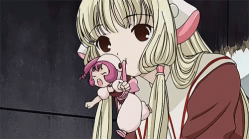 Girl With Blonde Hair Holding Pink Doll GIF