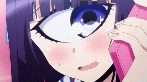 Girl with Blue Eyes Talking on Pink Phone