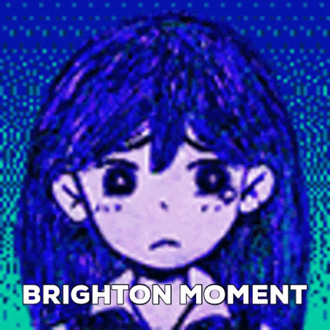Girl With Blue Hair and Black Eyes Saying Brighton Moment