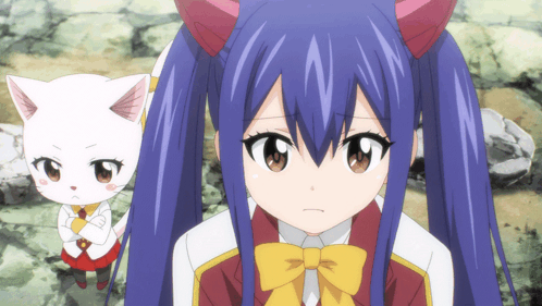 Girl with Blue Hair and Bow Tie Next to White Cat