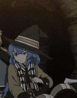Girl With Blue Hair and Witch Hat Waving