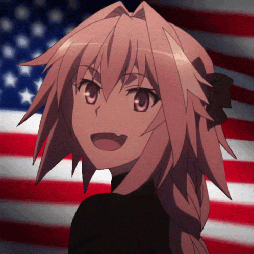 Girl With Braided Hair Smiling in Front of Flag