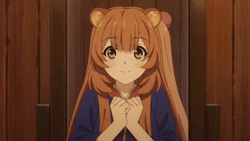 Girl With Brown Hair and Bear Ears Smiling Hands Folded