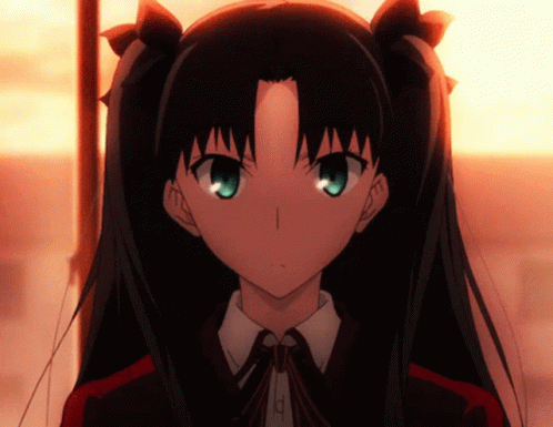 Girl with Dark Hair and Green Eyes in Red Shirt and Tie