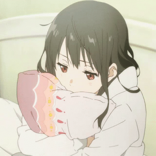 Girl with Dark Hair and Red Eyes Holding Pillow