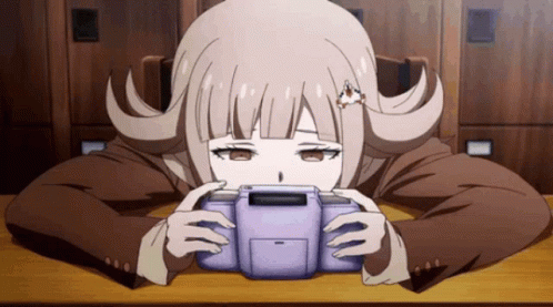 Girl With Flower In Hair Holding Game Console GIF