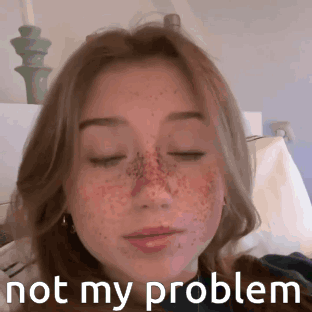 Girl With Freckles in Bed Eyes Closed Not My Problem