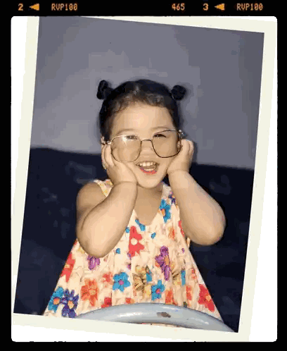 Girl with Glasses and Floral Dress