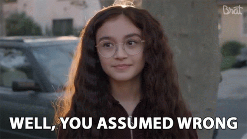 Girl With Glasses Says Well You Assumed Wrong In Front Of Car GIF