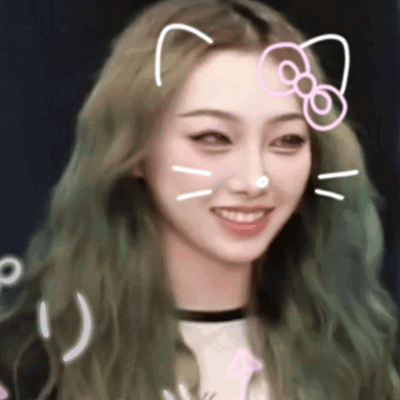 Girl with Green Hair and Hello Kitty Sticker