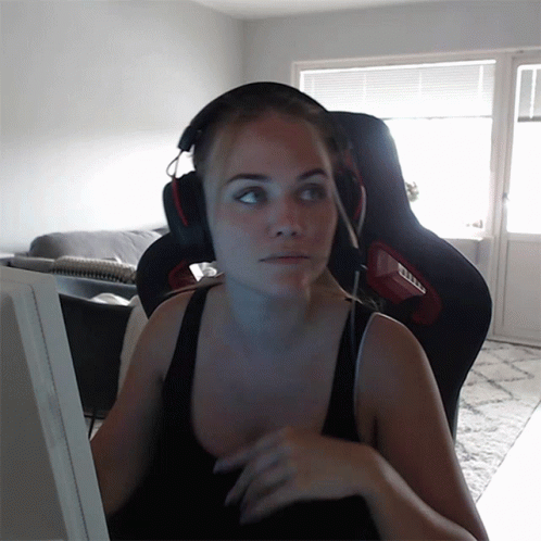 Girl With Headset Scratching Her Head GIF