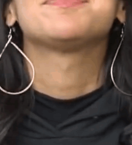 Girl With Hoop Earrings Swallow Motion GIF