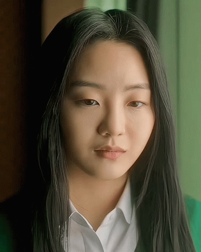Girl with Long Black Hair and White Shirt