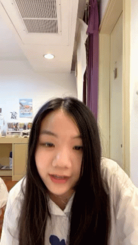 Girl with Long Black Hair Looking