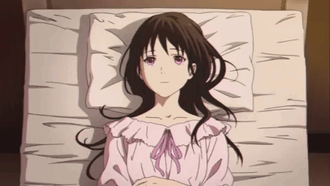 Girl with Long Black Hair Lying on Bed