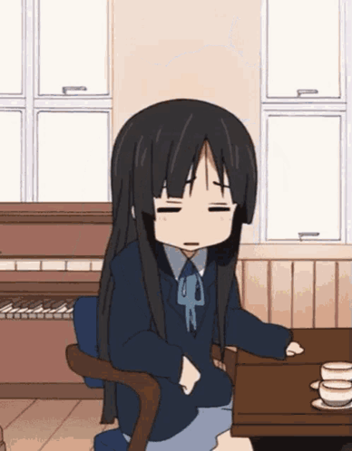 Girl with Long Black Hair Sitting with Eyes Closed