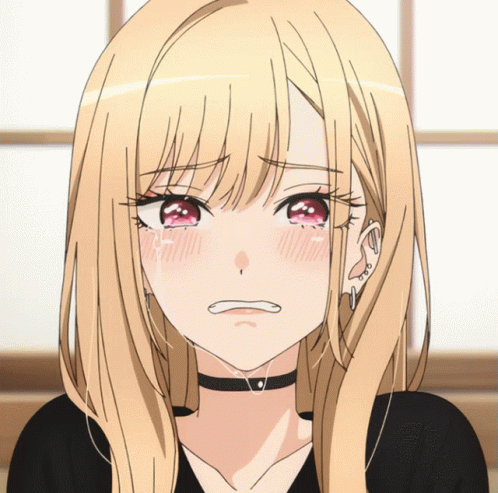 Girl With Long Blonde Hair and Red Eyes Crying