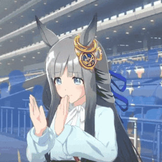 Girl with Long Hair and Ears Standing in Stadium Hands Folded