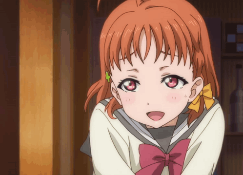 Girl With Orange Hair and Red Eyes in Pink Bow