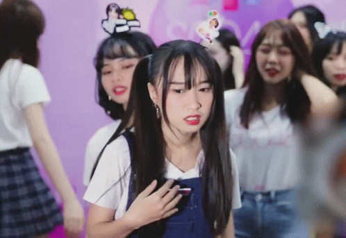 Girl With Pigtails and Sticker Saying A