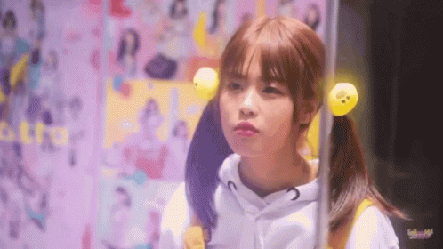Girl With Pigtails and Yellow Duck in Hair
