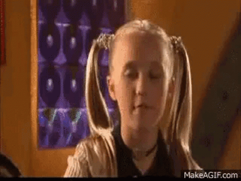 Girl with Pigtails Making Funny Face