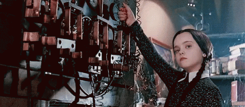 Girl With Pigtails Working on Machine