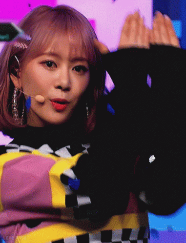 Girl With Pink Hair in Black Sweater