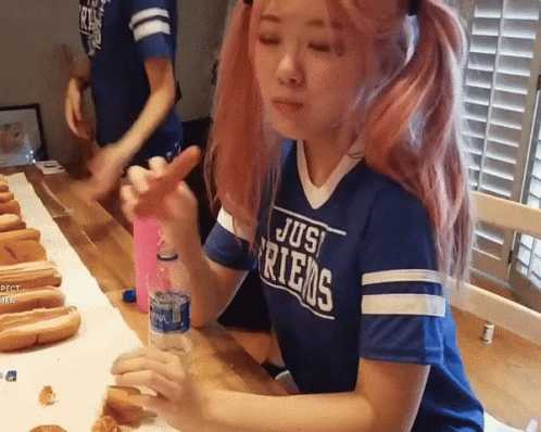 Girl With Pink Hair in Blue Shirt Saying Jus Friends