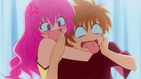 Girl With Pink Hair Making Funny Face GIF