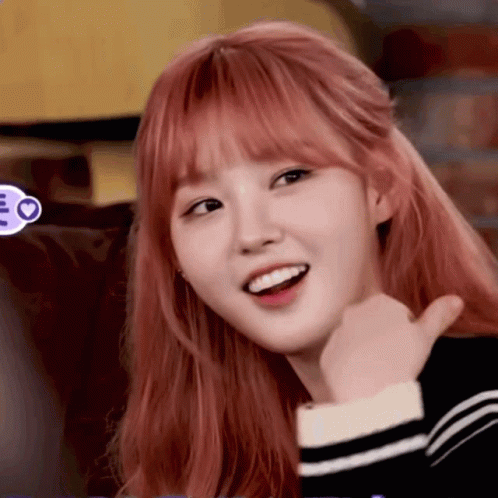 Girl With Pink Hair Smiling and Thumbs Up