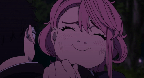 Girl With Pink Hair Smiling Held by Man