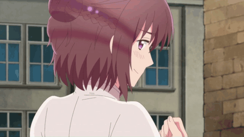 Girl With Purple Eyes By Brick Building GIF